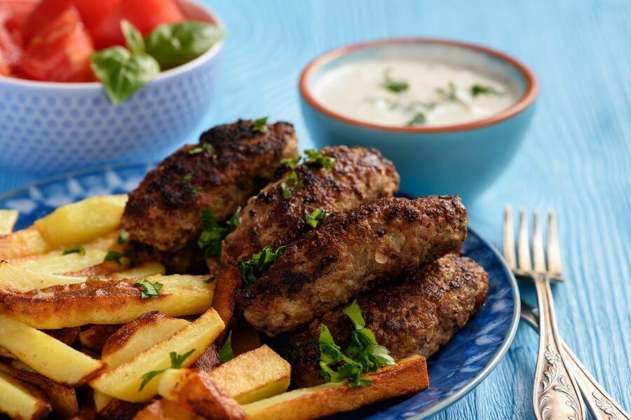 Dish with Cevapcici and Fried Potatoes