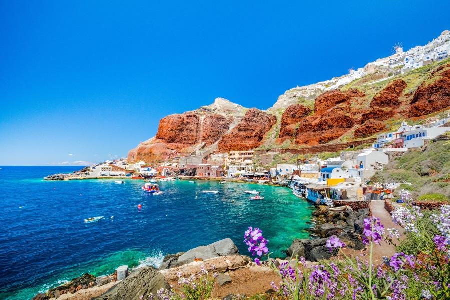 The old harbor of Ammoudi under the famous village of Ia at Santorini, Greece