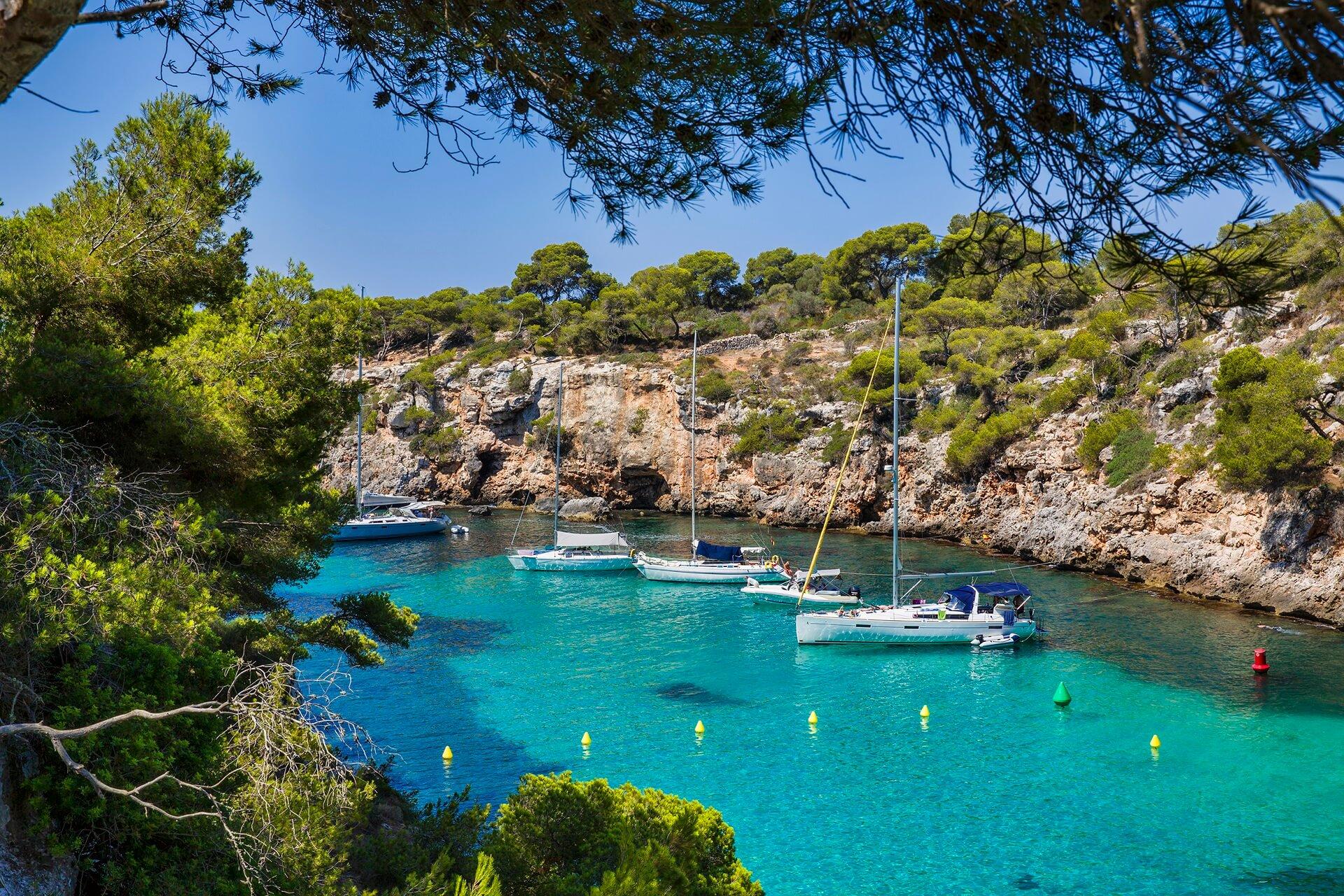 The beautiful blue shimmering bay of Cala Pi in Mallorca