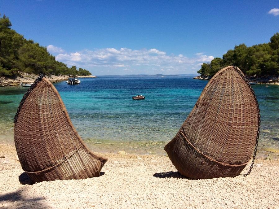 two-wicker-beach-chairs-on-hvar_shutterstock_454672201