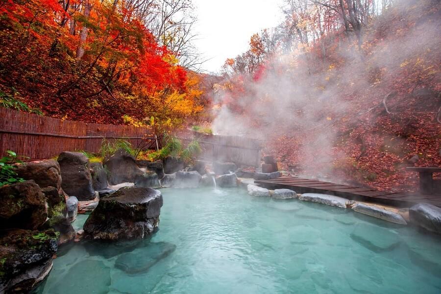 Japanese onsens are hot springs, whose thermal water is so warm that it steams in winter air.
