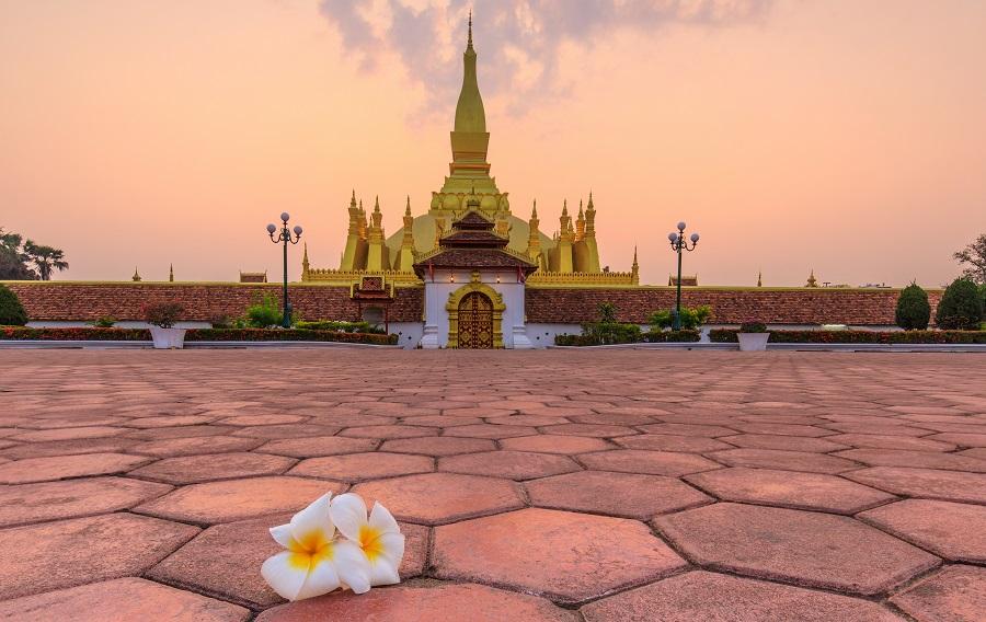 Pha That Luang, A Gold Buddhist Stupa In The Morning
