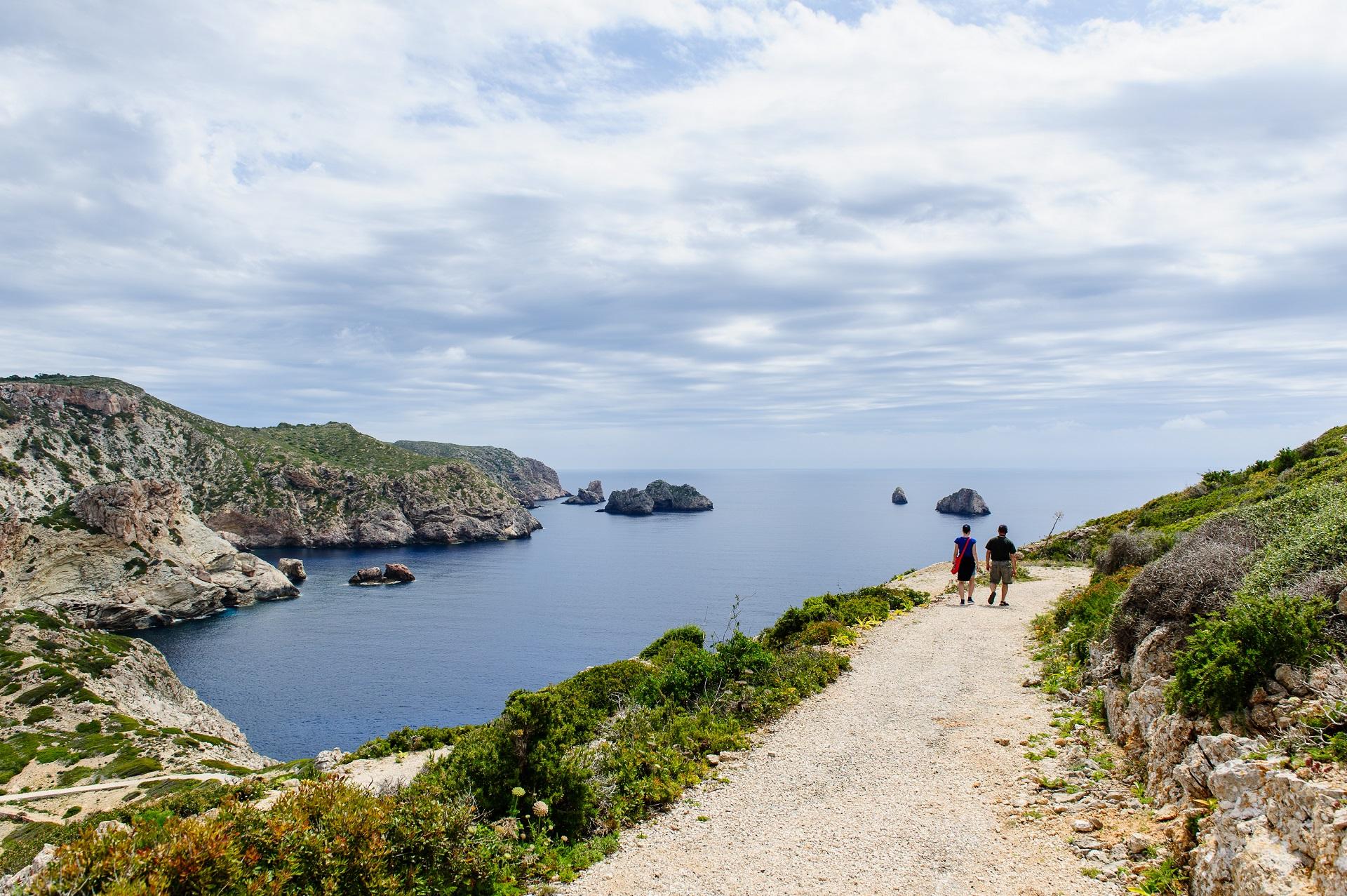 Treveller's couple walking. Mediterranean islands.