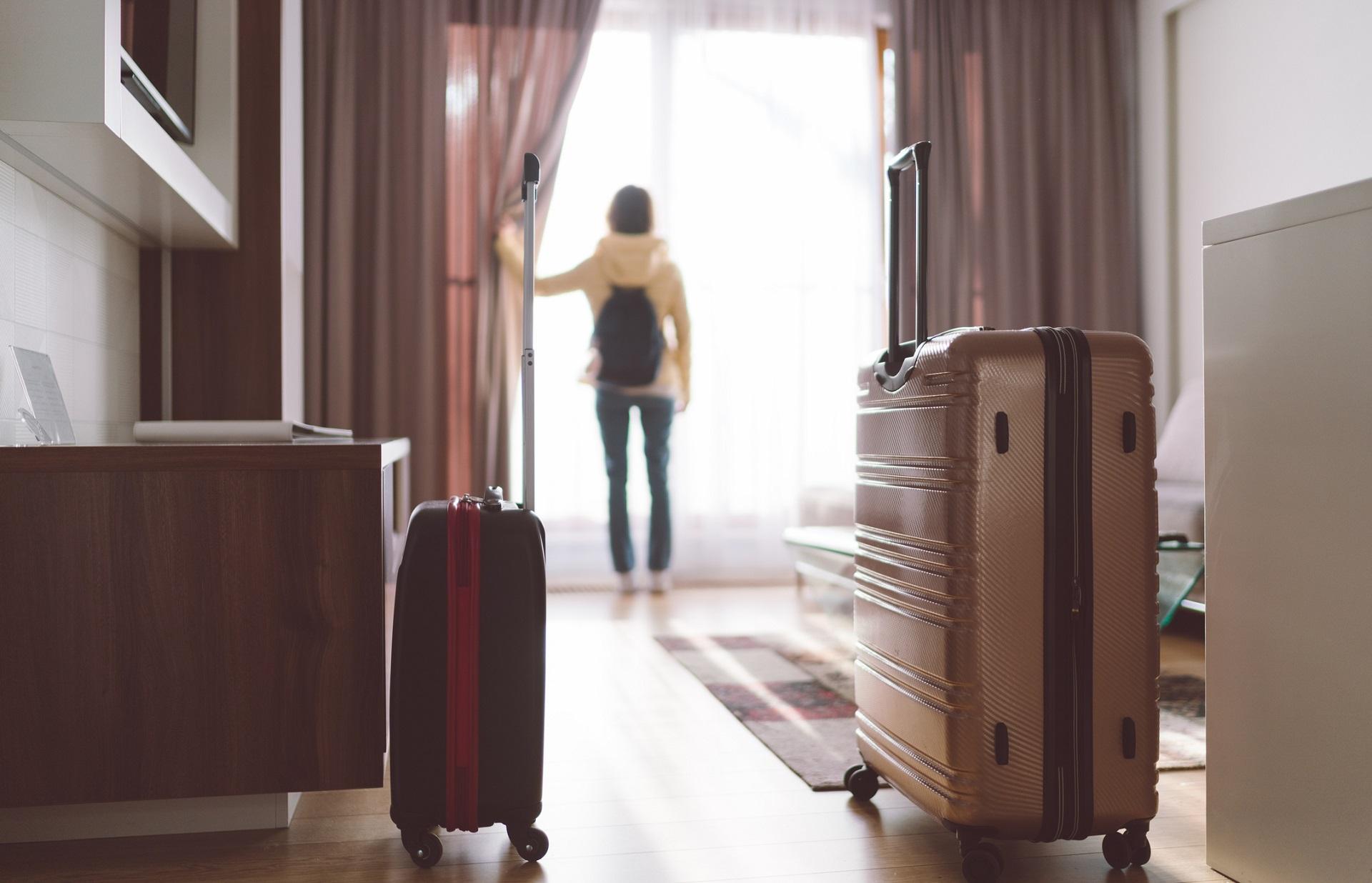 A woman in a hotel room