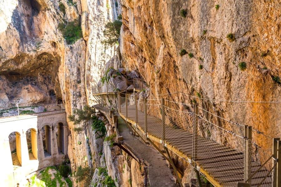 Spain's Caminito del Rey takes you along wooden paths by steep cliffs. On one side, it drops down for meters.