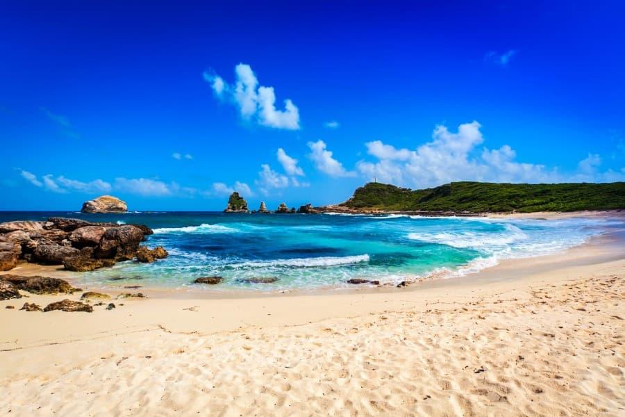 beach-and-rocks-at-pointe-des-chateaux-guadeloupe-istock_000030200056_large-2-1