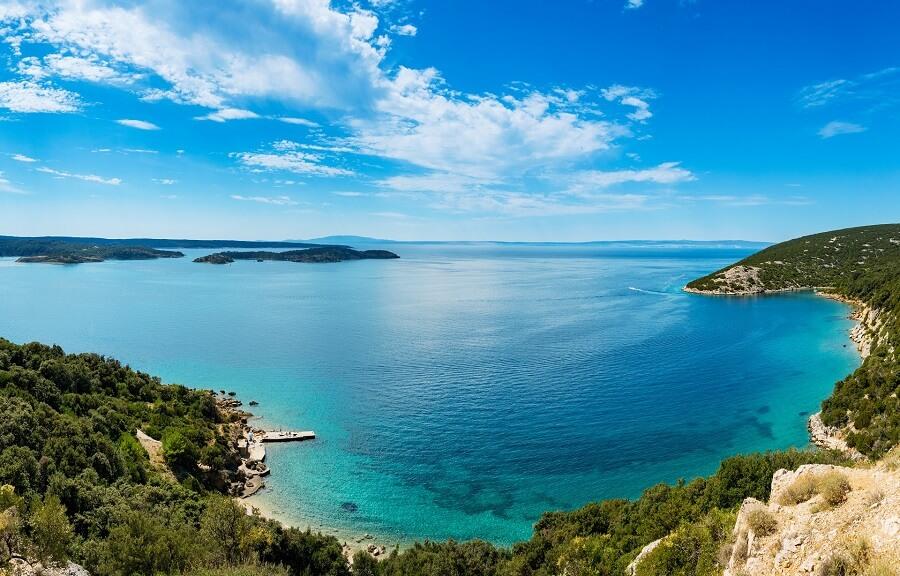 Panoramic view of the Adriatic Sea and the island of Cres in the distance near town of Lopar on island Rab in Croatia