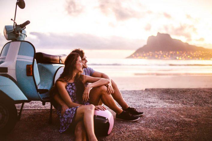 Couple enjoying the sunset on the beach