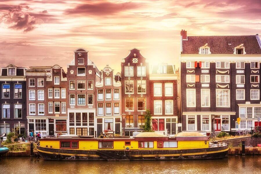 Houseboat in the Canal of Amsterdam