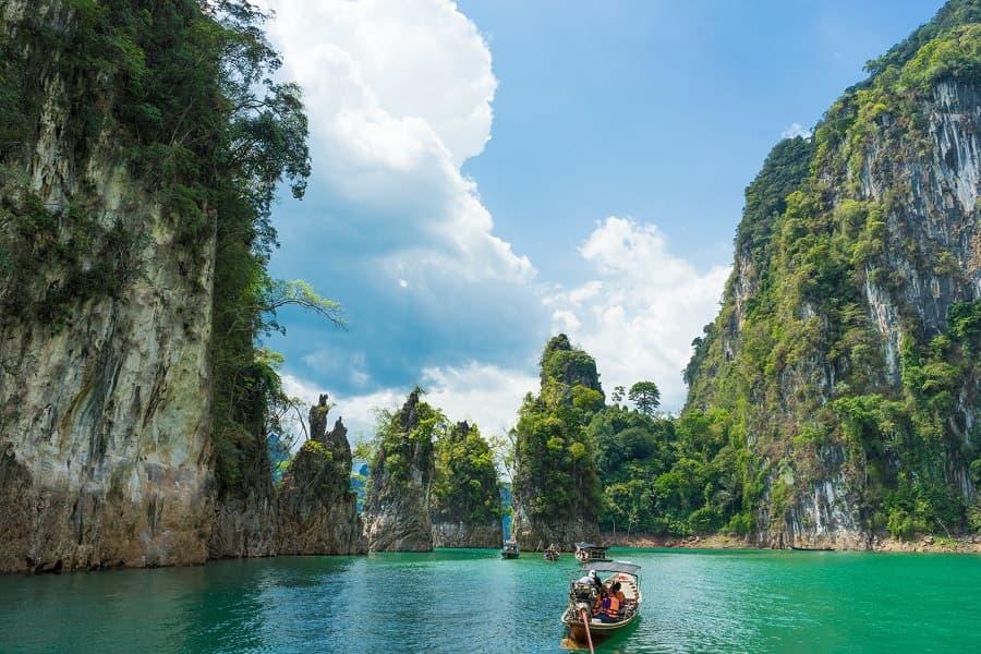 Limestone cliffs rise dramatically from the turquoise water.