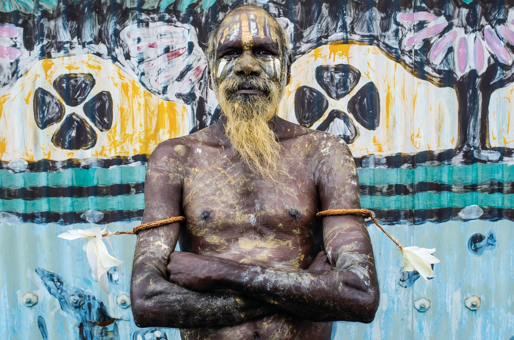 An Aboriginal person crosses their arms in front of their chest on the Tiwi Islands in the Northern Territory of Australia.