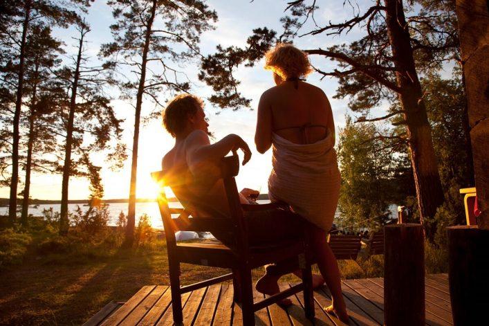 Couple by the lake in Finland