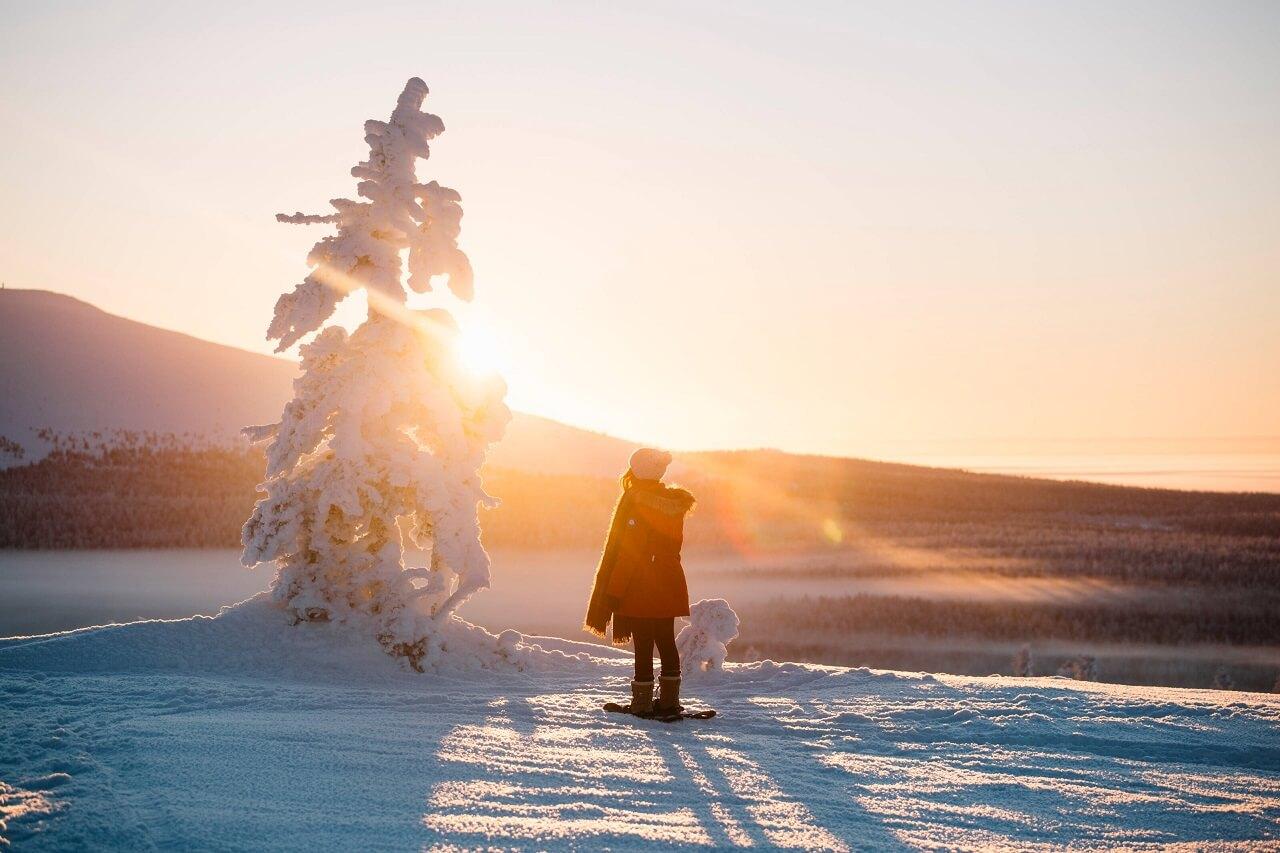 Woman in the snow in Finnish Lapland