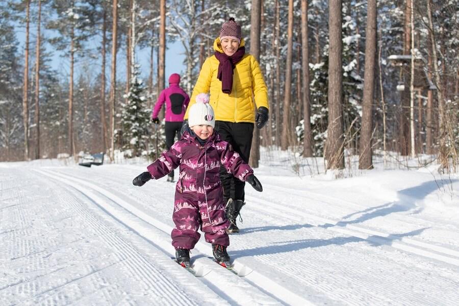 Child cross-country skiing in Lapland