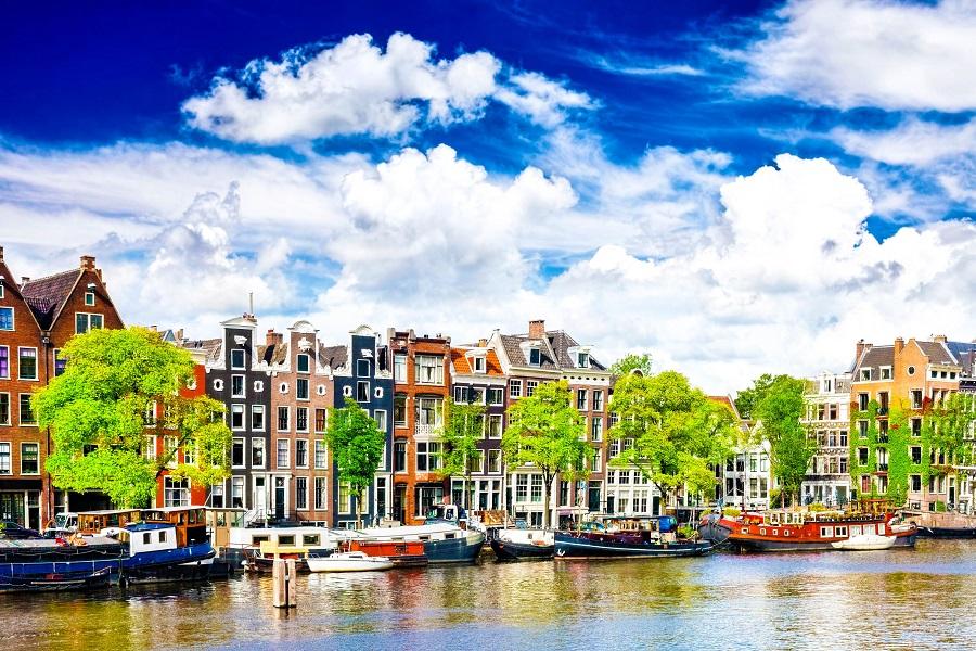 amsterdam-with-canal-in-the-downtown-holland-istock_000030442394_large-2