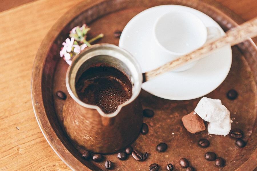 Typical Greek coffee in a small pot. -nick-karvounis-719177-unsplash