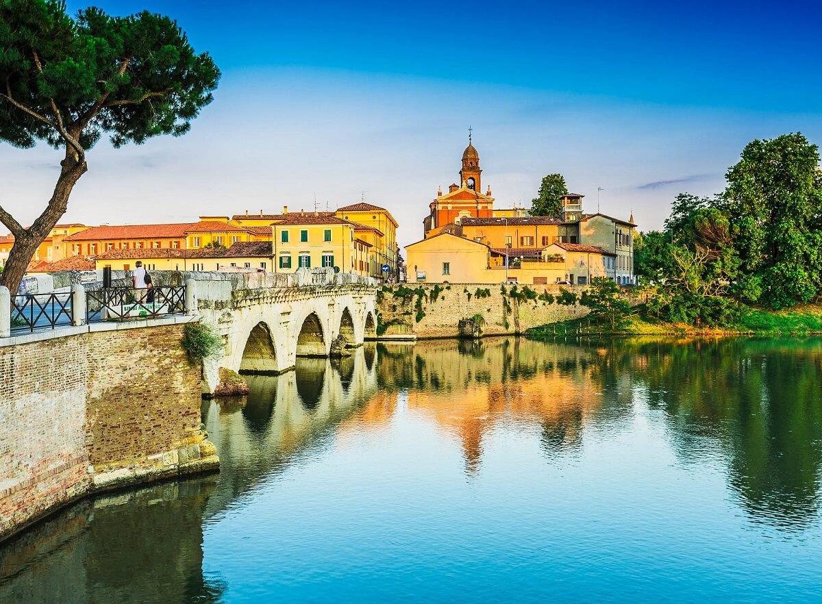 Old bridge in Rimini just before sunset