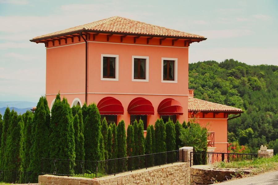 Two-story vacation house on a hillside in Lopud. In the background, you can see the green vegetation of the beautiful Croatian island.