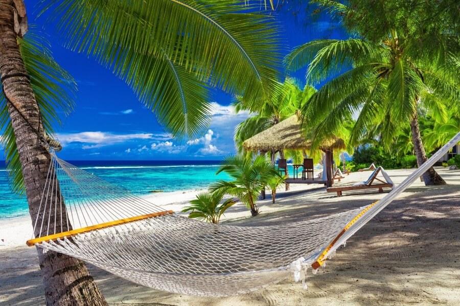 Hammock directly by the sea on one of the paradise Cook Islands