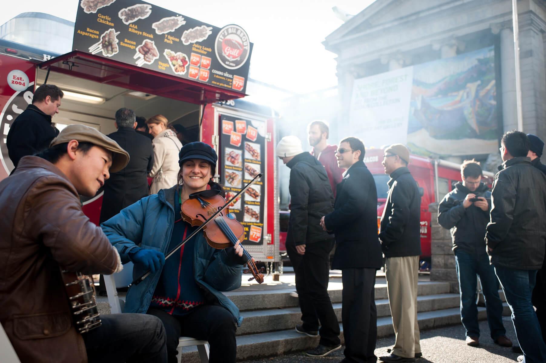 People together at a food truck in Vancouver