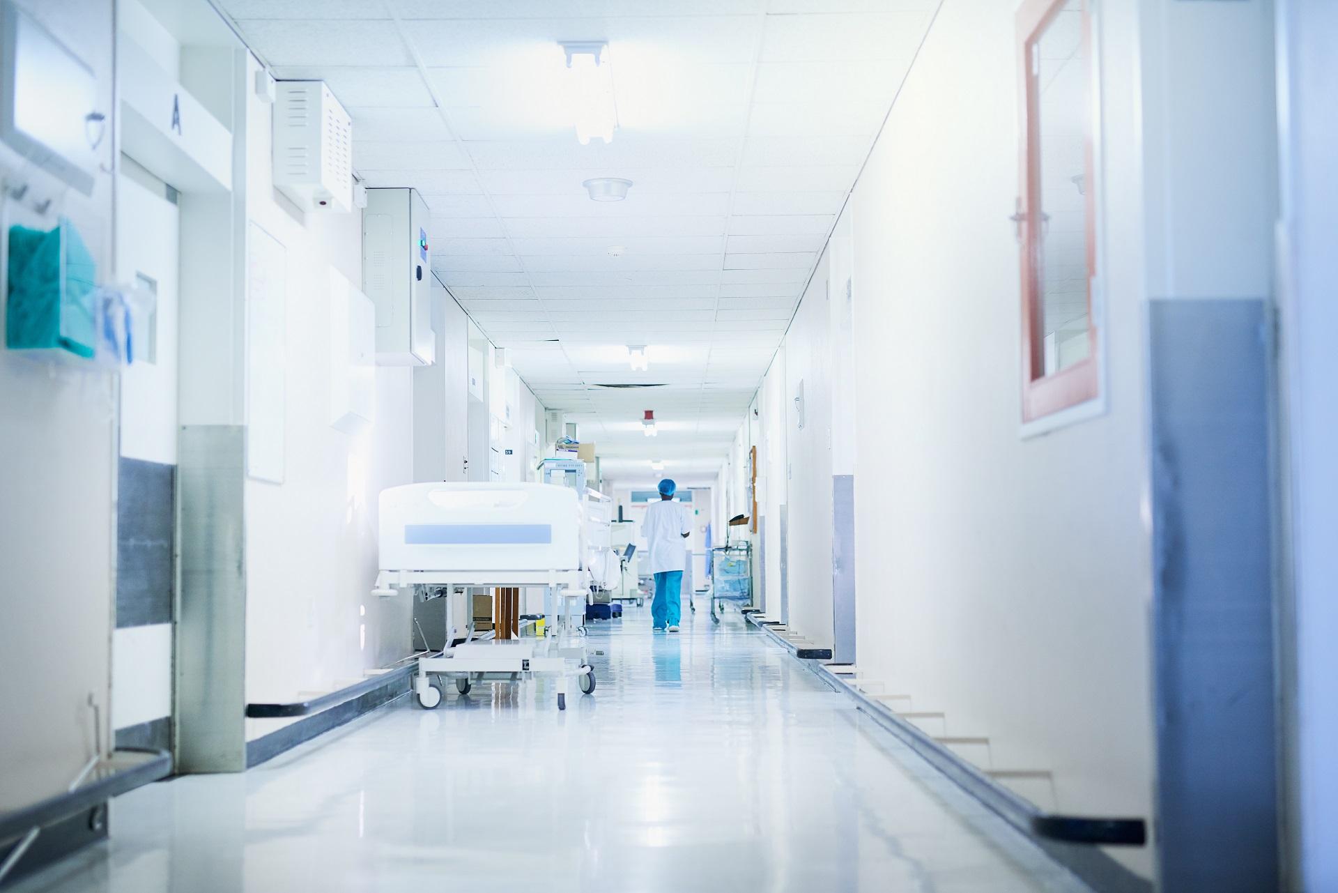 Hospital hallway with hospital bed