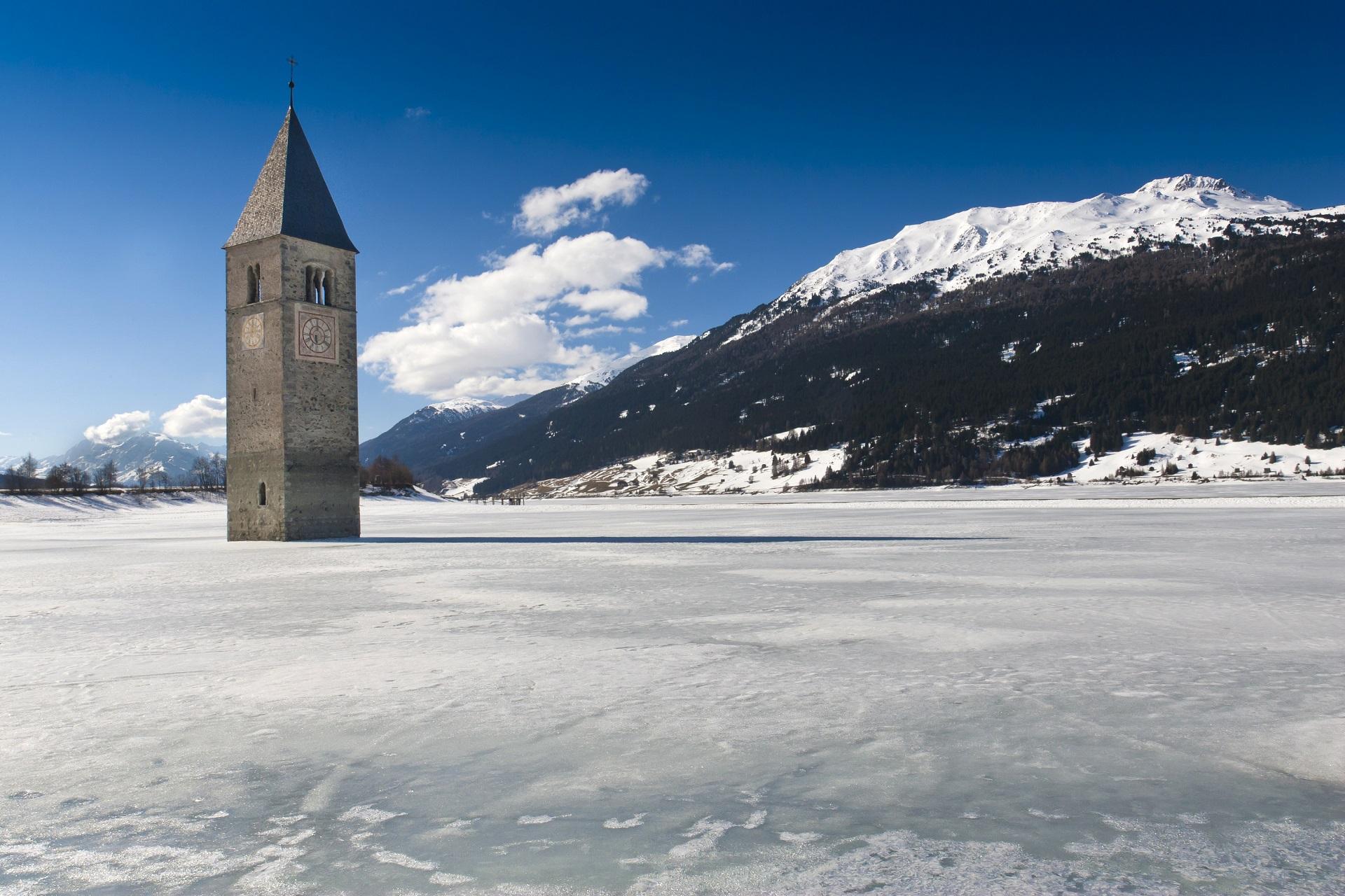 Frozen Reschensee in Winter