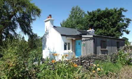 exterior white painted  Birch Cottage