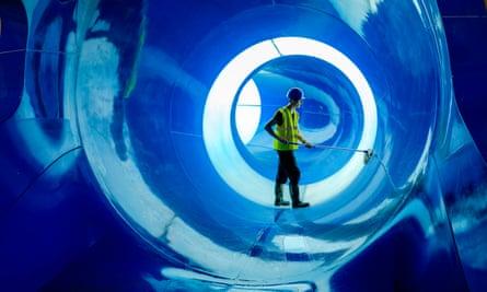 A worker finishes off cleaning one of the four huge water slides at the Alpamare waterpark in Scarborough.