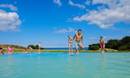 Families at the outdoor infinity pool at the new Alpamare Waterpark which opens to the public on 30 July, in Scarborough, North Yorkshire.