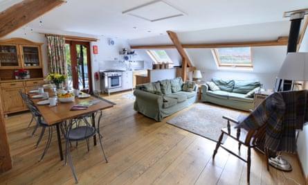 Living and dining area of The Tollant cottage near Rhayader, Powys, Wales