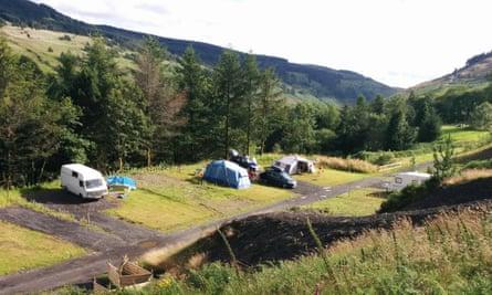 Cars, campervans and tents at Willow Springs, Afan Forest Park, Wales