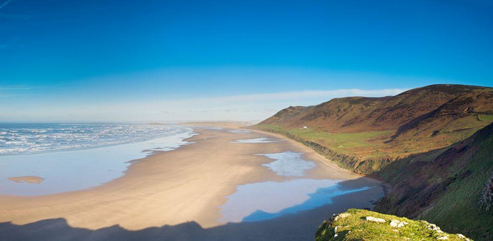 Großbritanniens Westen: Wunderschönes Wales - der Strand der Rhossili Bay zählt zu den schönsten der Region